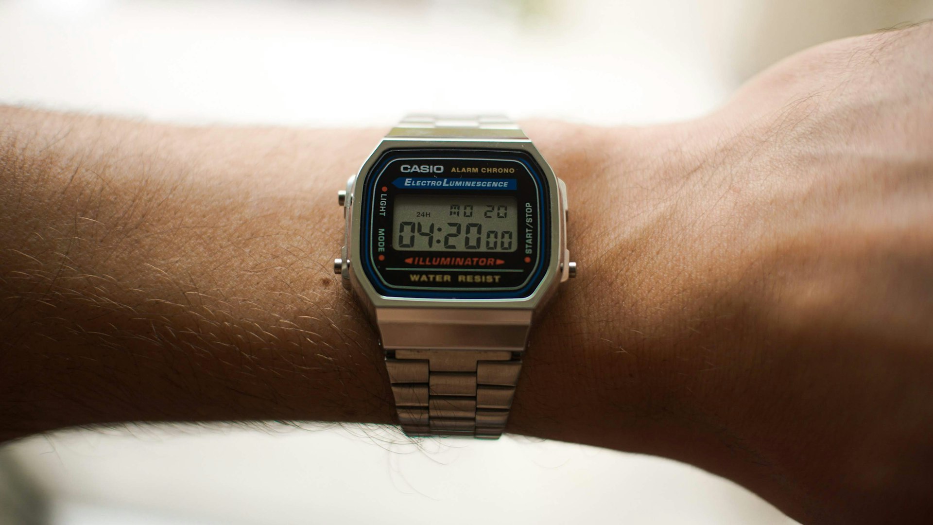 a close up of a person's wrist with a watch on it